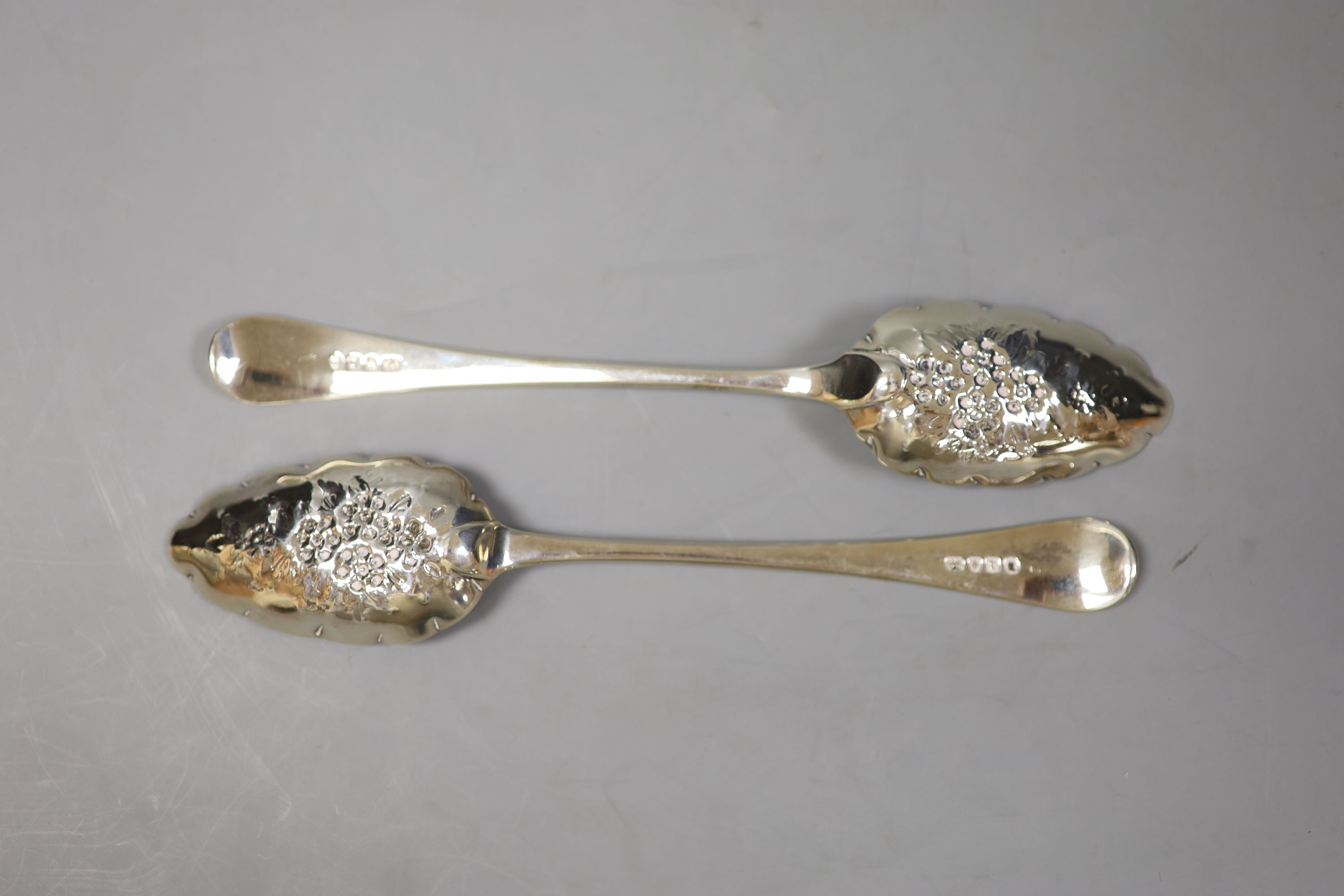 A pair of late Georgian silver berry spoons, London, 1794,